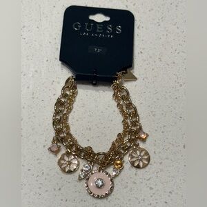 Guess Gold and Pink Multi-Charm/chain Bracelet